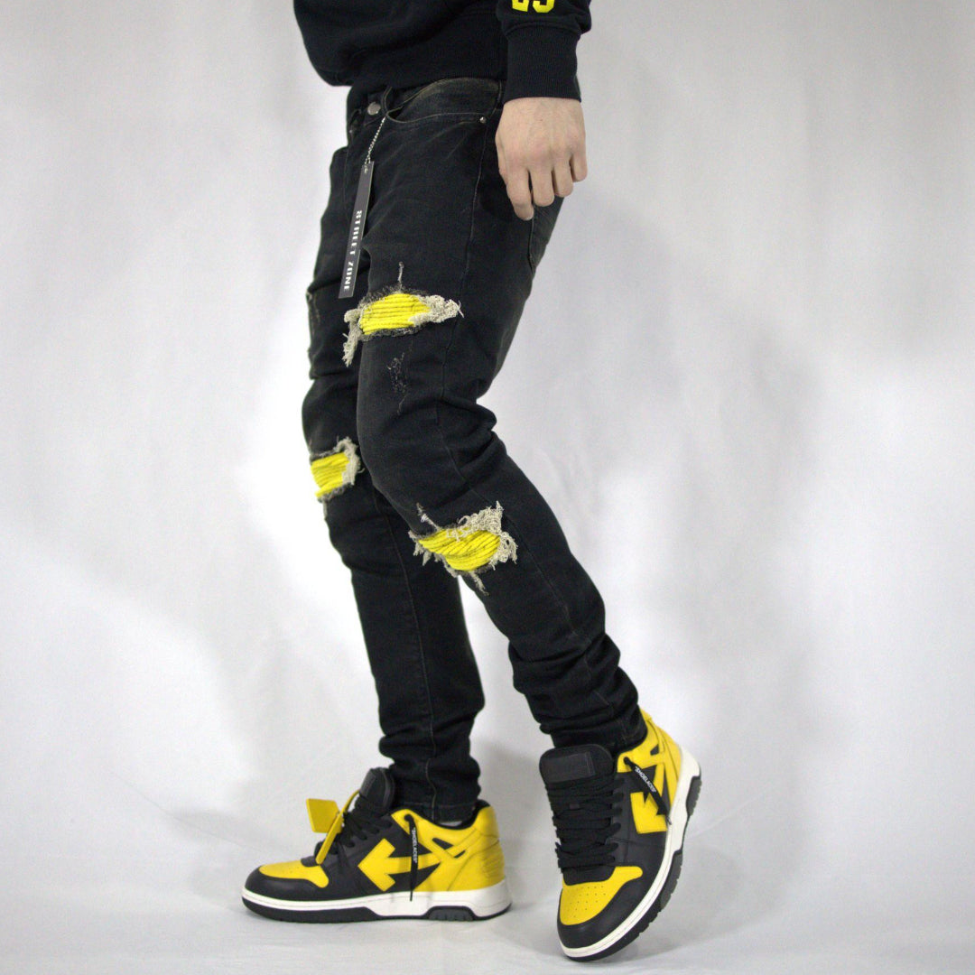 Yellow ripped jeans